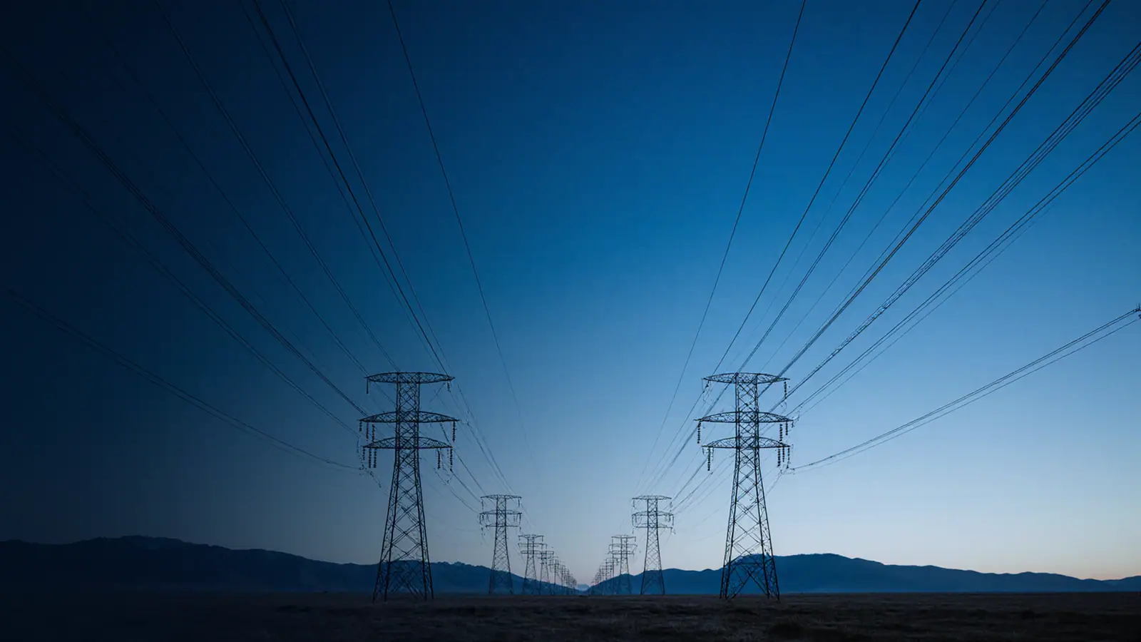 Overhead transmission lines at dusk